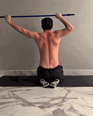 Overhead arm alternation with a stick